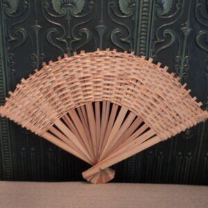 vintage wicker fan wall decor